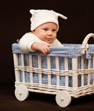 Our Clients - Baby inside "grocery" trolley