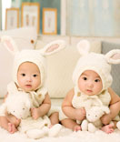 Our clients - babies wearing rabbit costume
