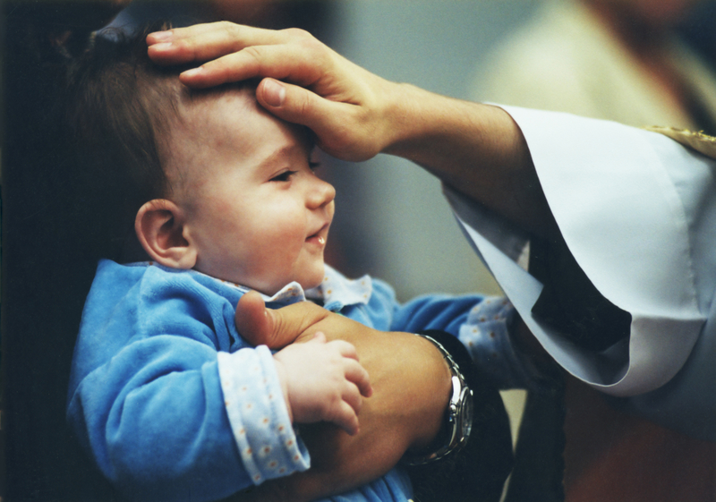 Newborn Christening - Baby getting blessed